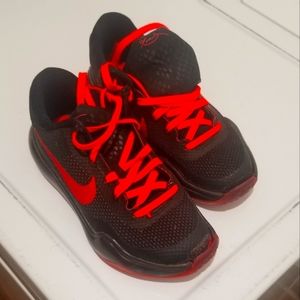 Boys Nikes size 12C black and orange